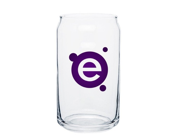 A clear glass with a purple element logo.