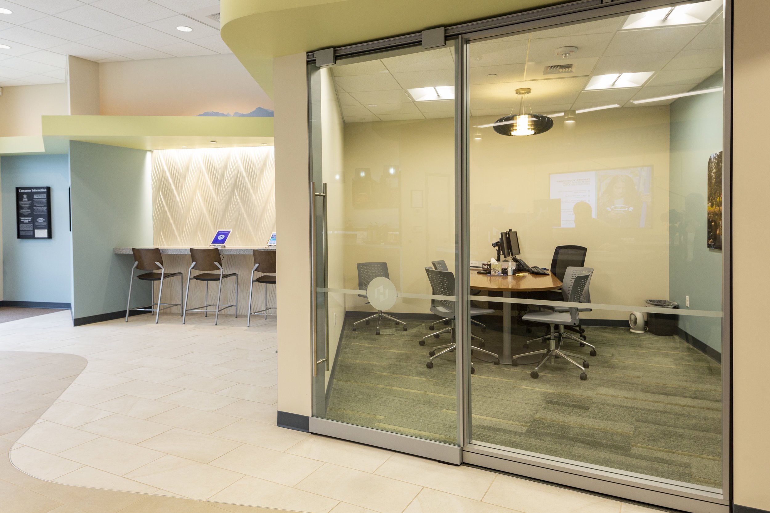An outside view of a corner, glass office.