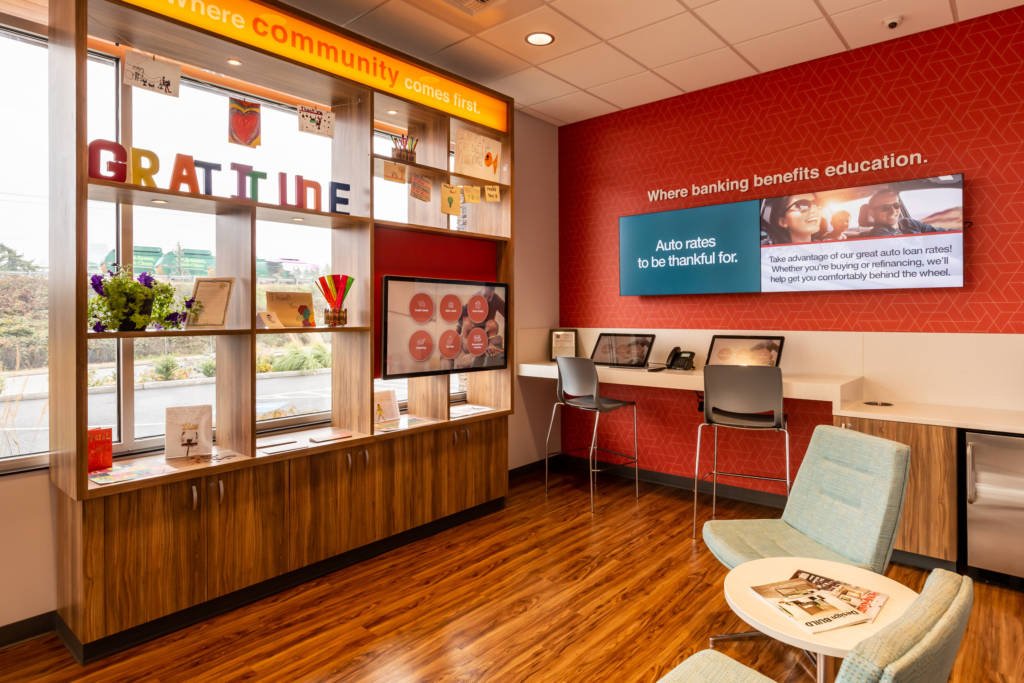 A waiting area with shelves against the window with pictures and the word "gratitude".